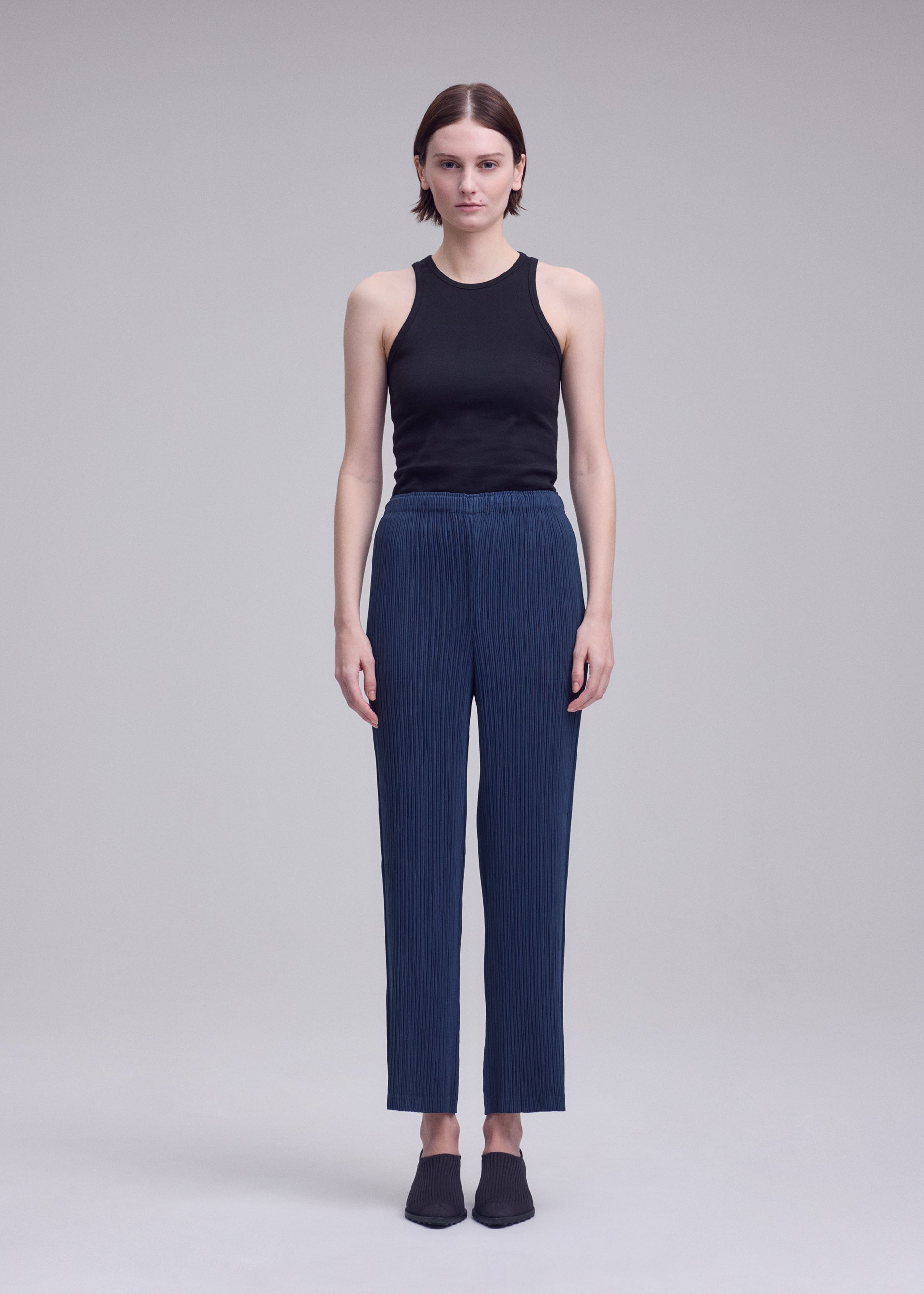 Issey Miyake Hatching dámské kalhoty černé plisované