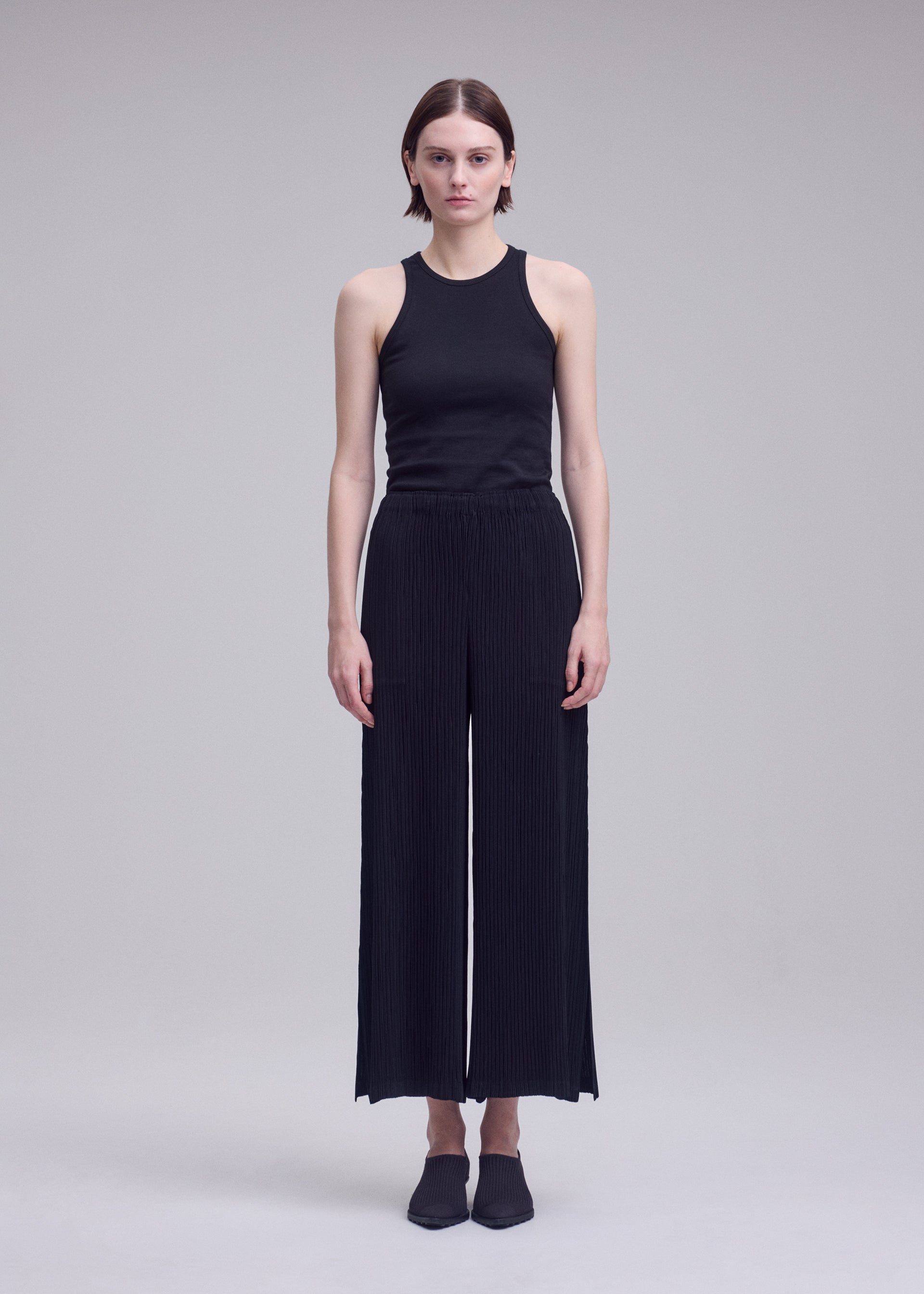 Issey Miyake Hatching Bottoms kalhoty černé plisé