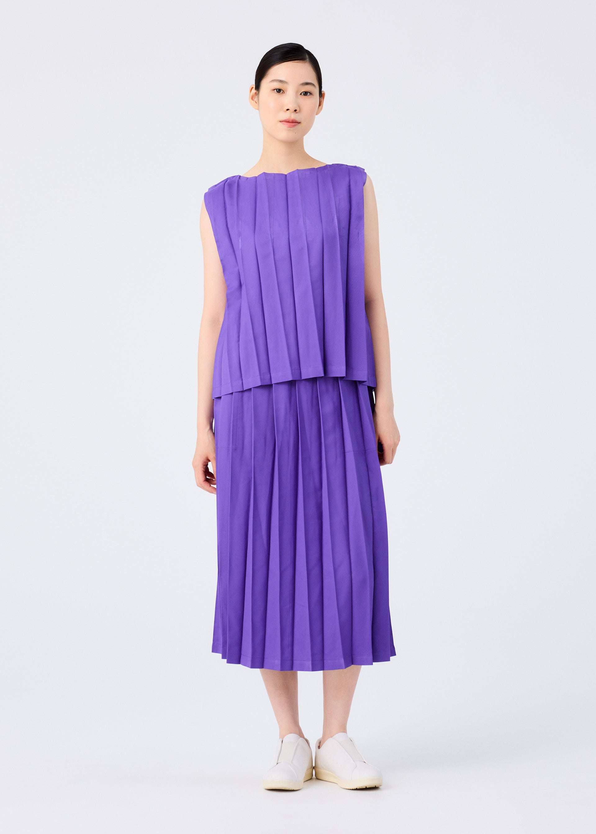 Issey Miyake Cross Pleats sukně černá plisovaná kapsy