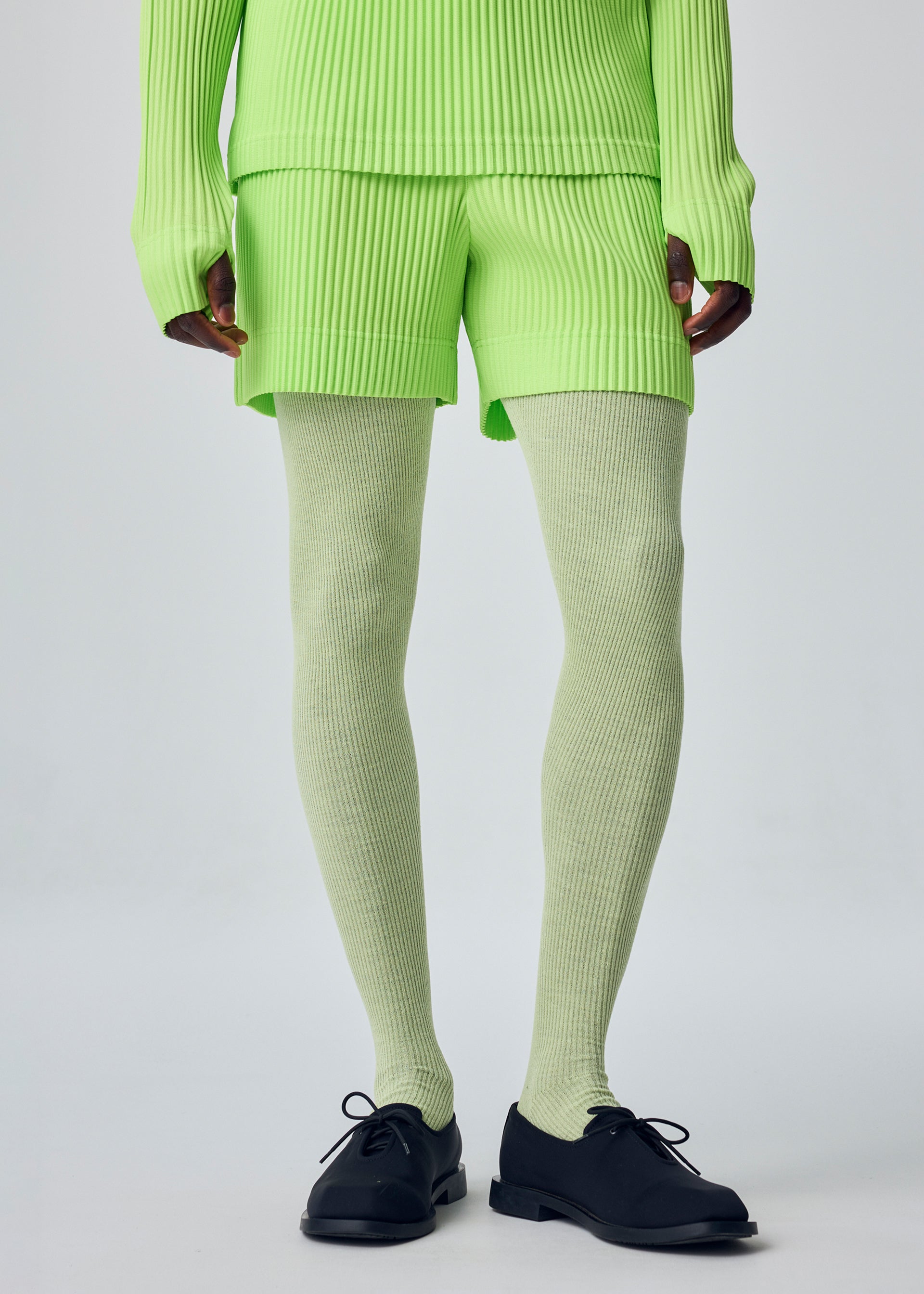Homme Plissé Issey Miyake Knit Unraveled pletené kalhoty