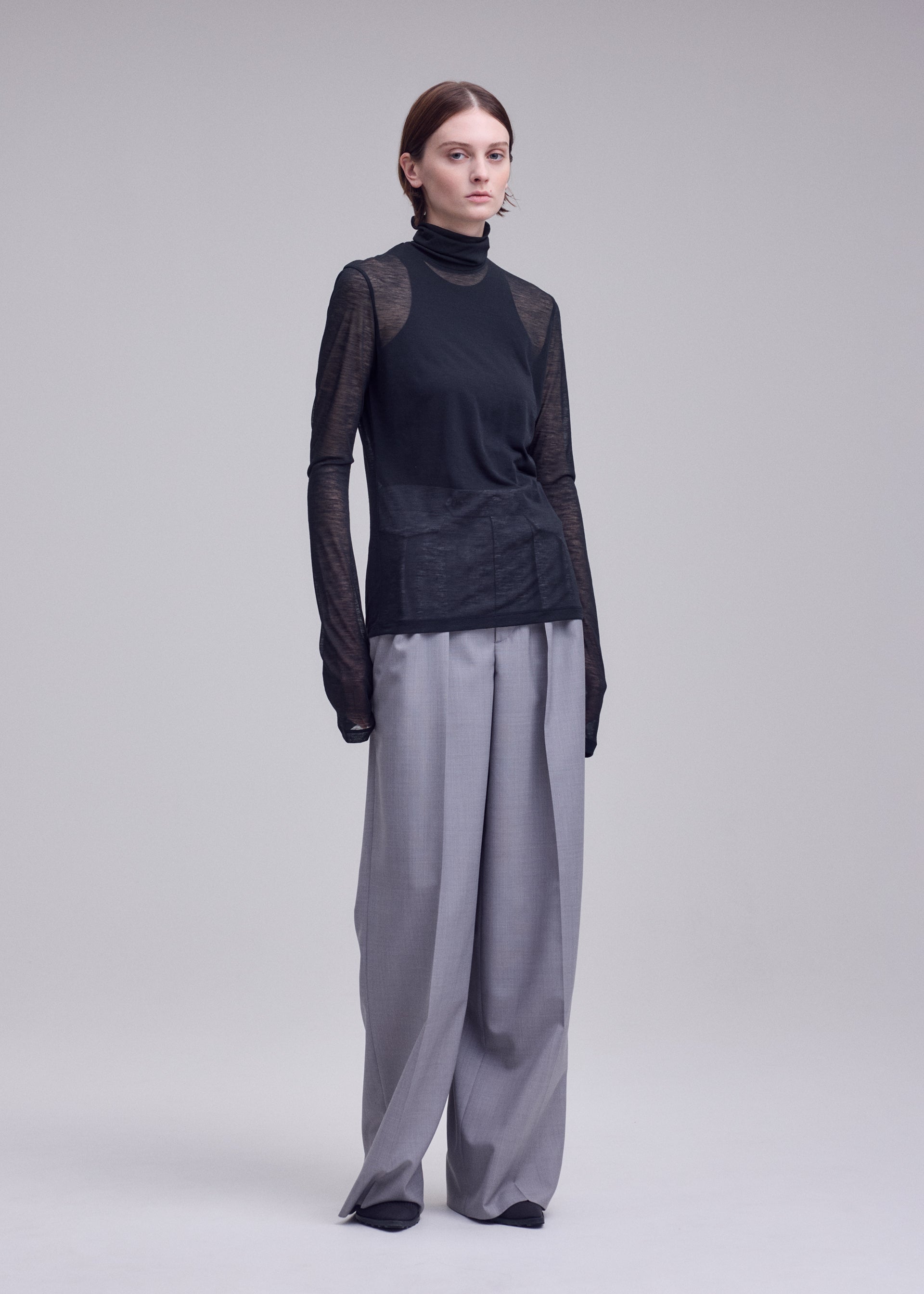 Issey Miyake Sheer Wool Jersey průsvitný rolák černý