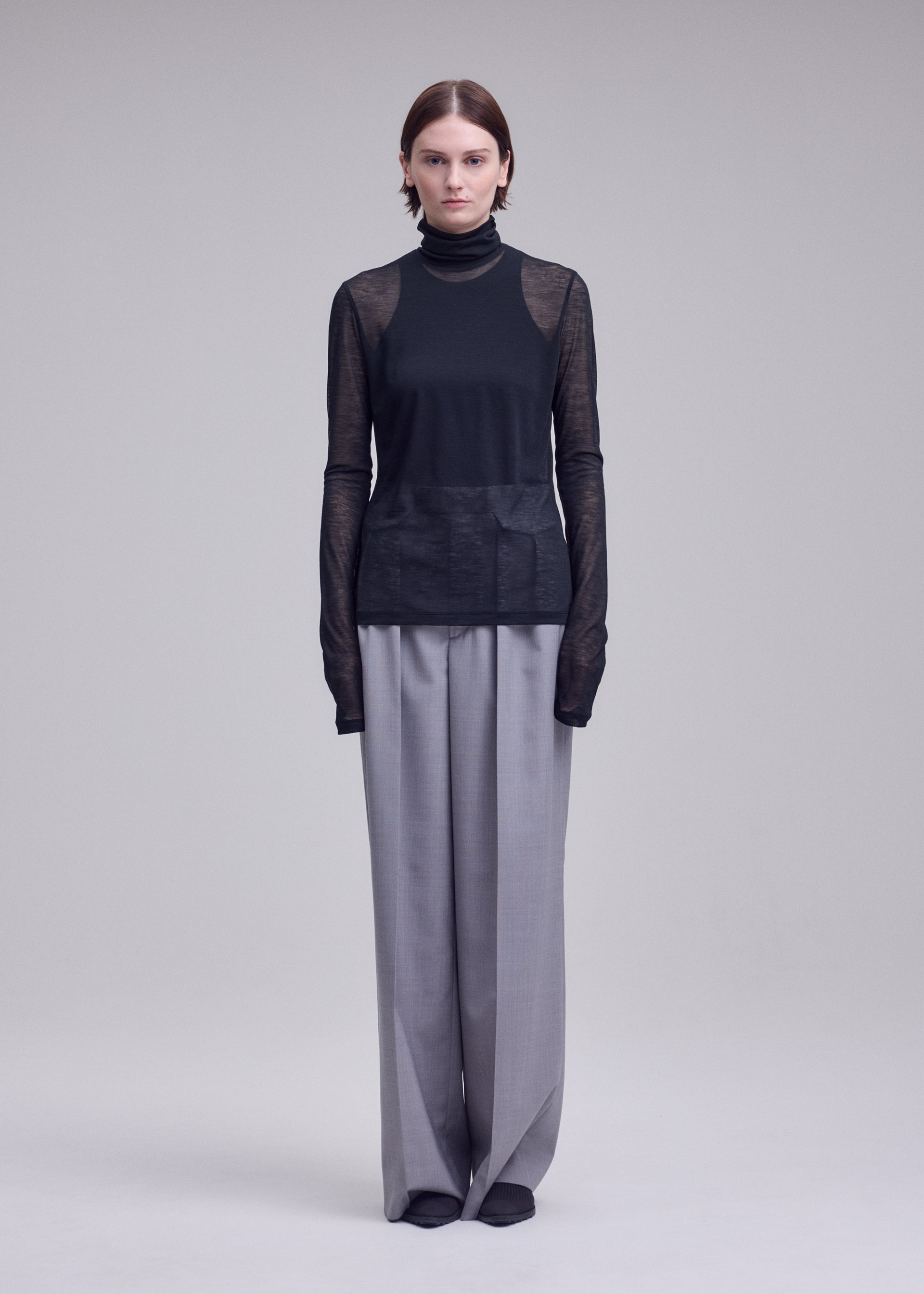Issey Miyake Sheer Wool Jersey průsvitný rolák černý