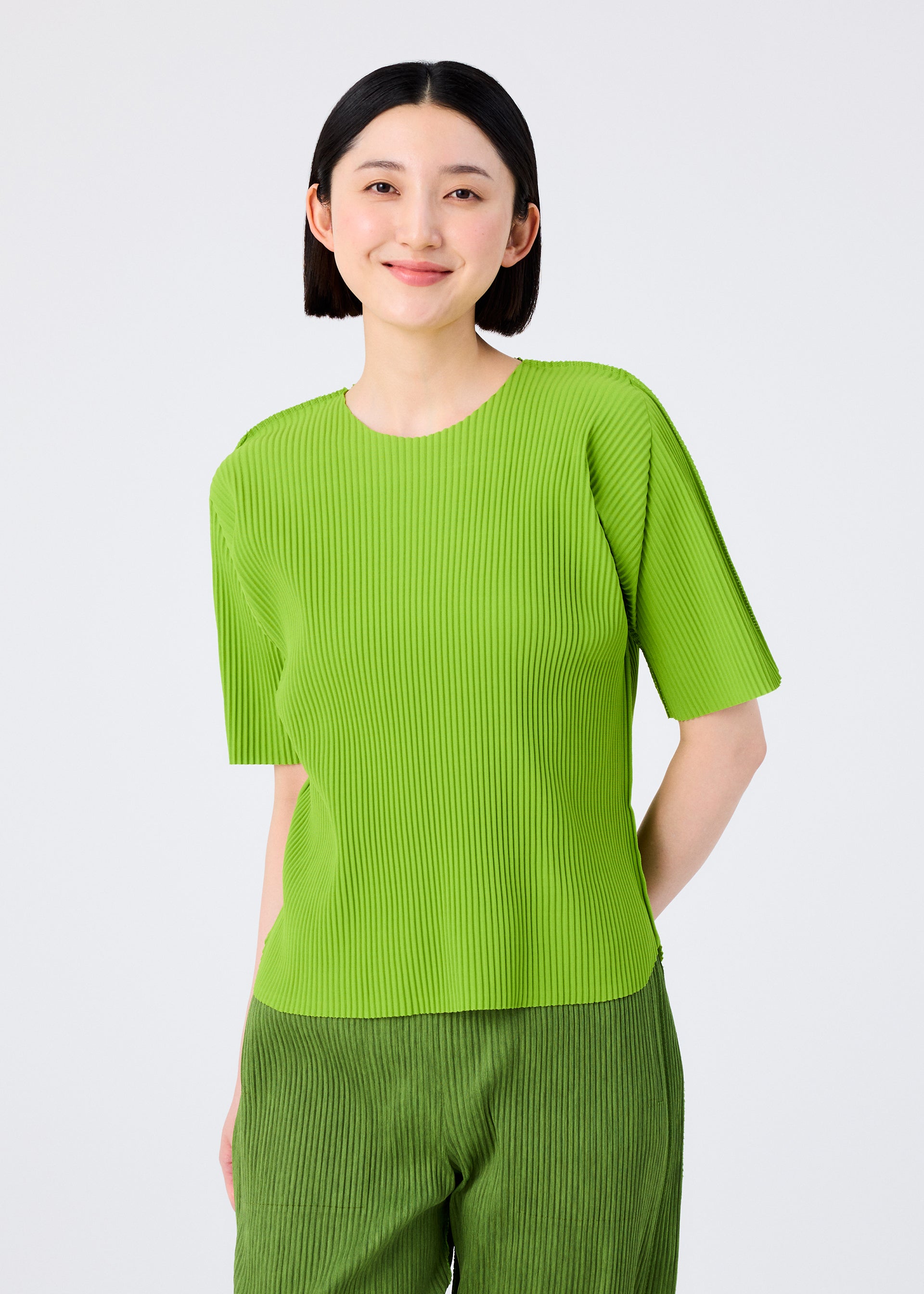 Issey Miyake Round Pleats top žlutý plisovaný krátký rukáv