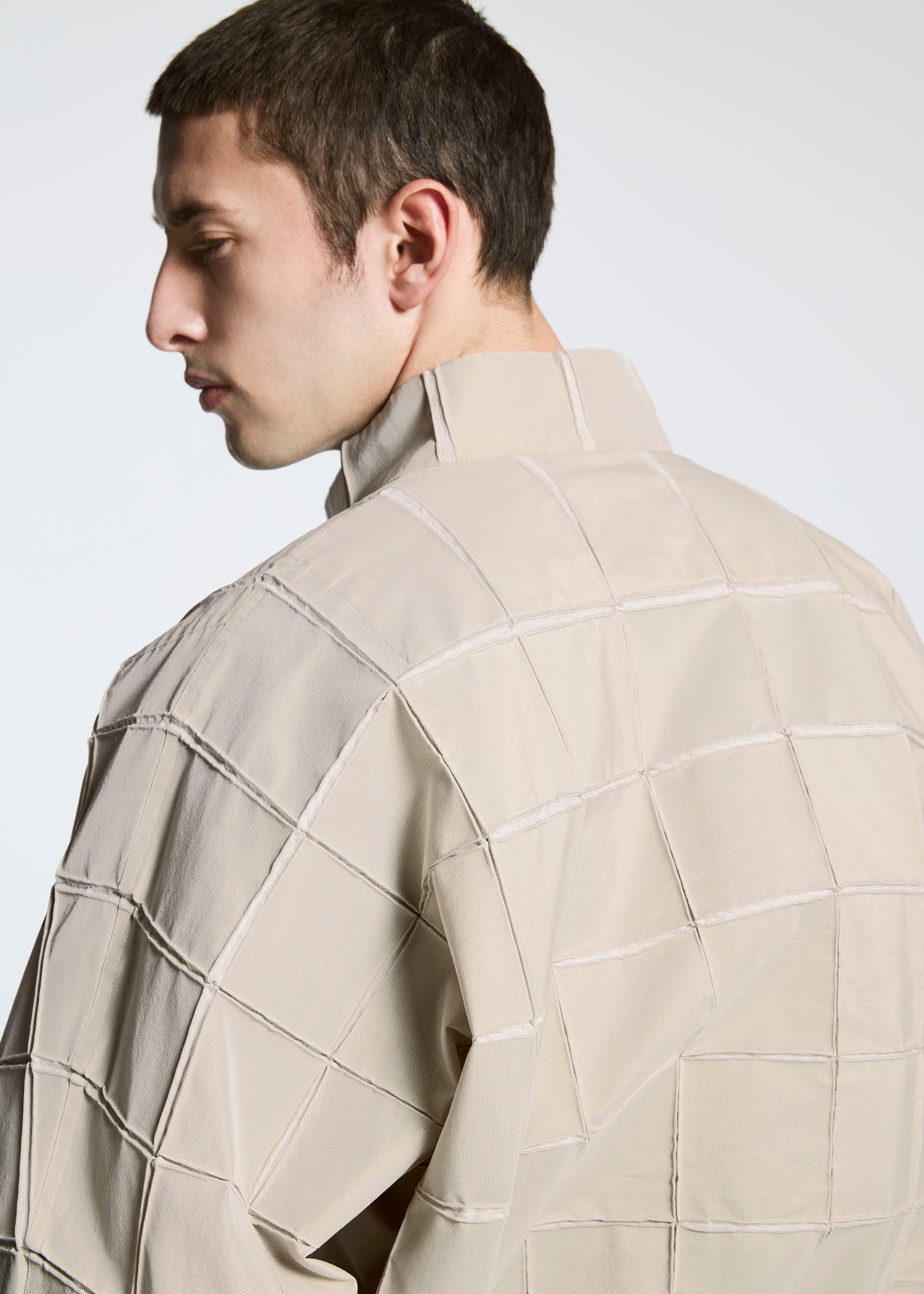 Issey Miyake TYPE-O 002 bunda černá strečová mřížka