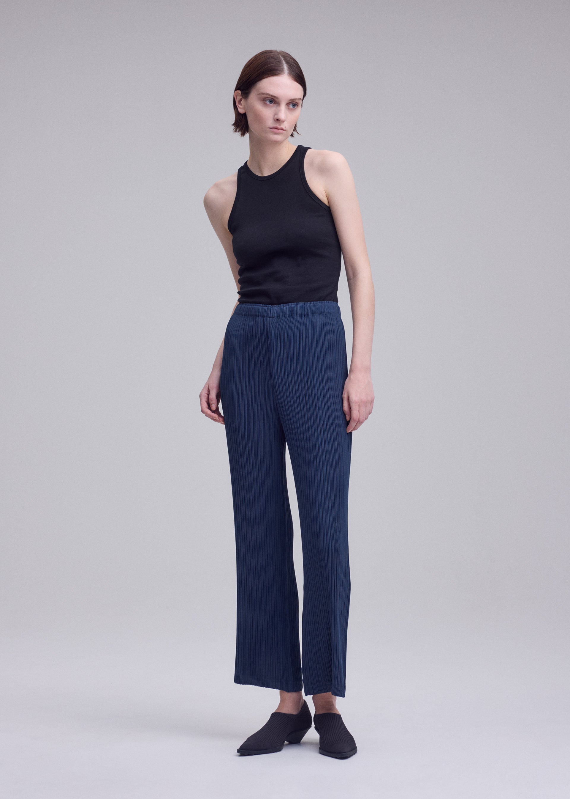Issey Miyake Hatching dámské kalhoty černé plisované