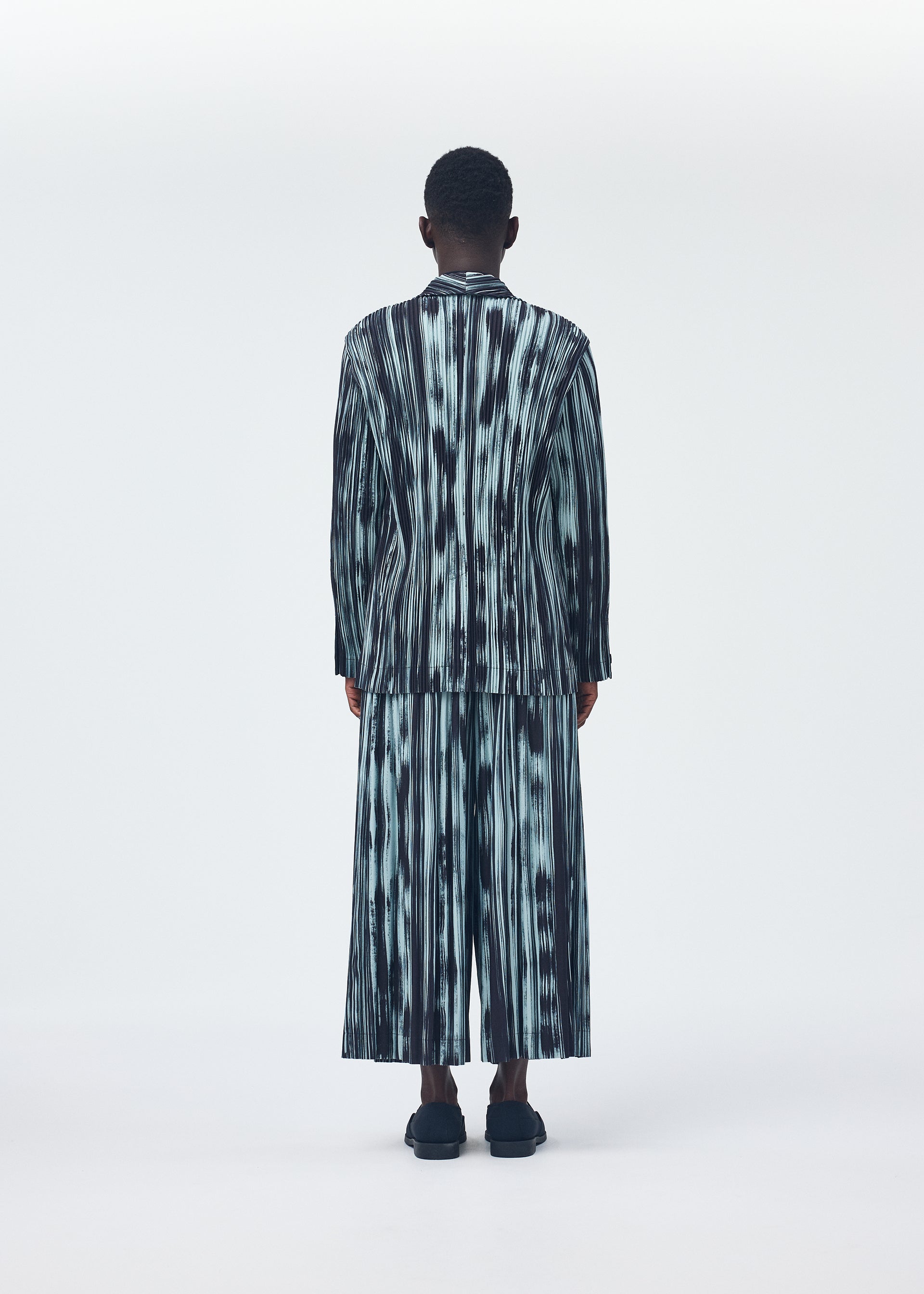 Issey Miyake Homme Plissé Brushstroke Stripe kalhoty černé plisované