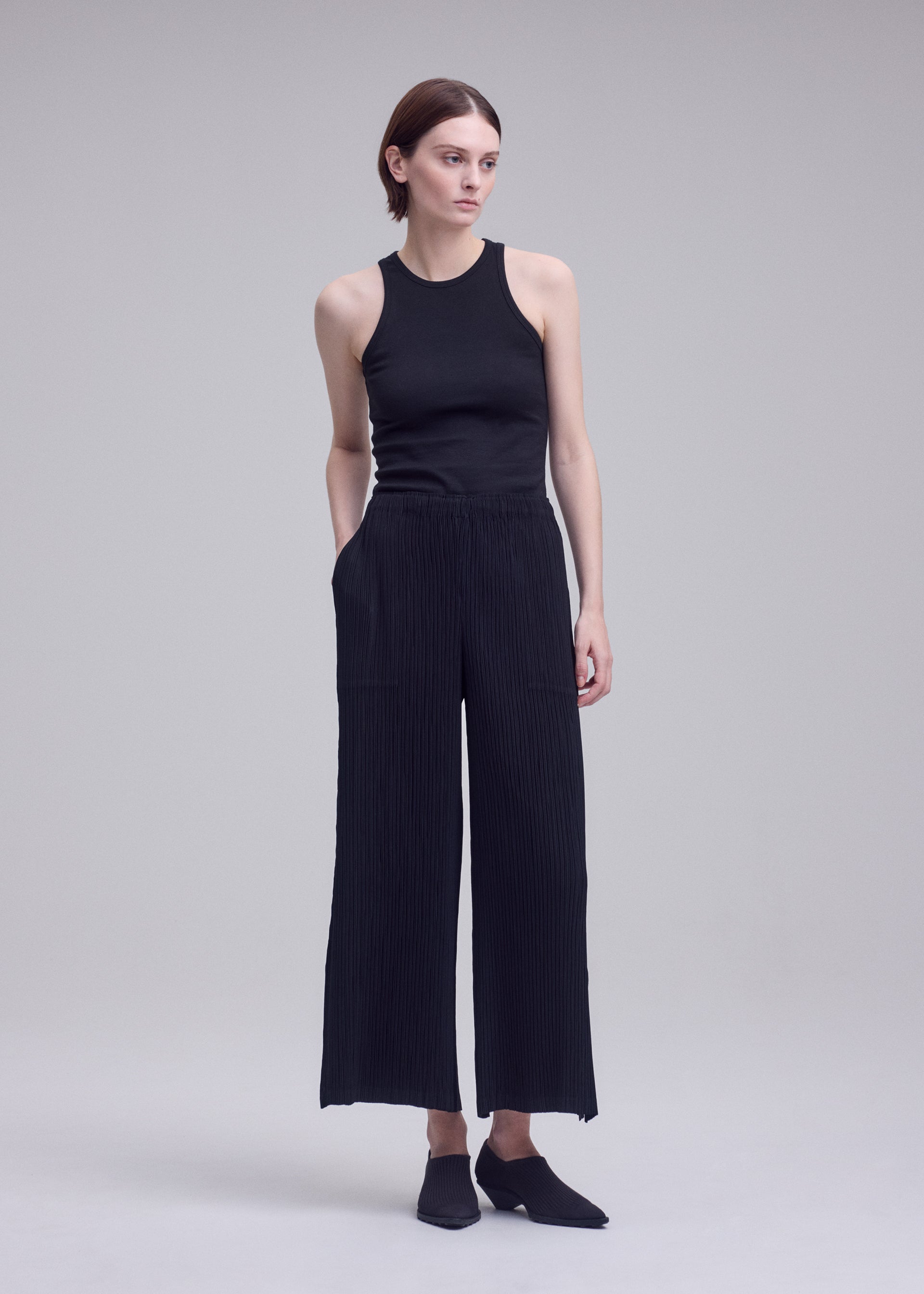 Issey Miyake Hatching Bottoms kalhoty černé plisé