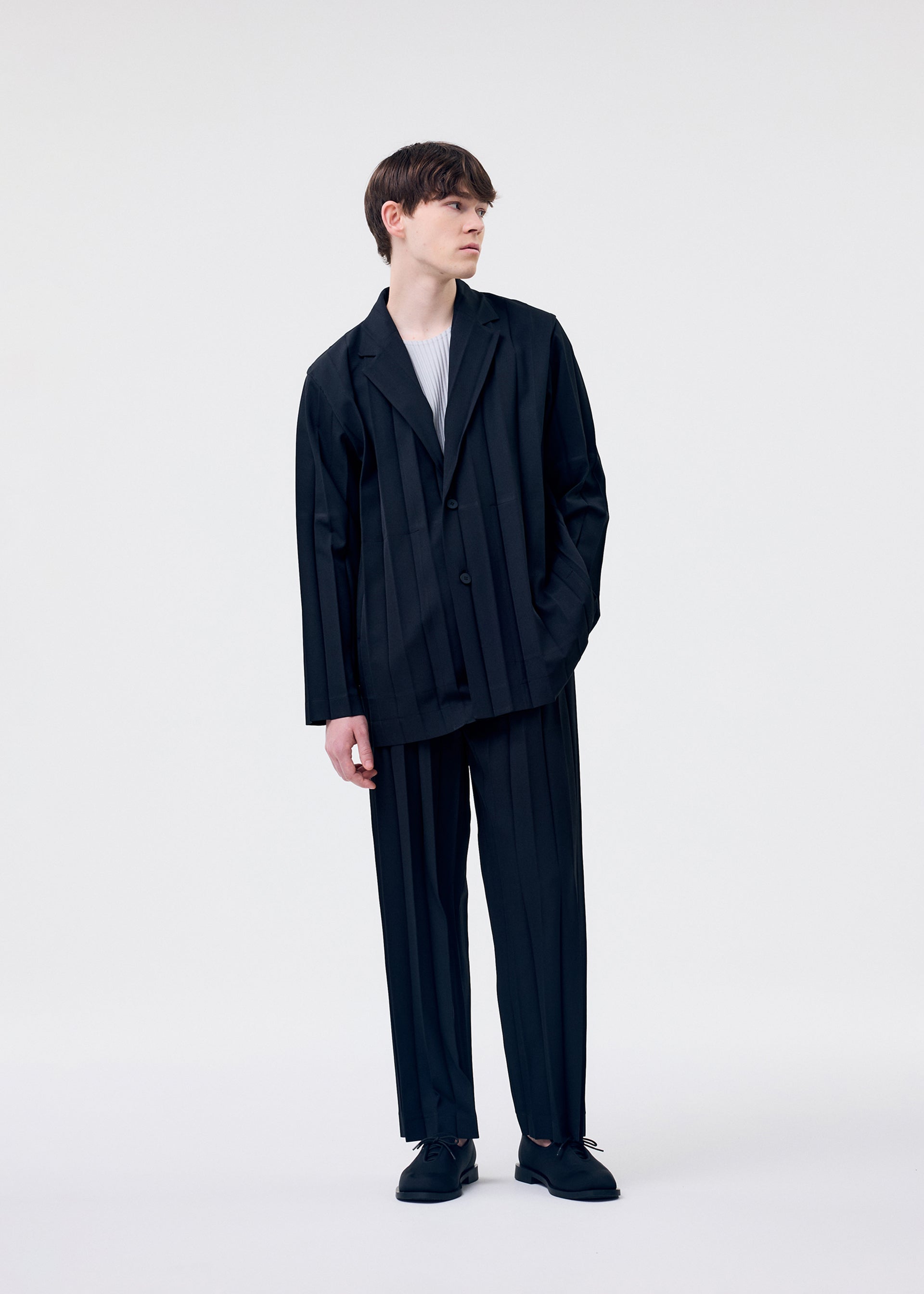 Issey Miyake Edge Ensemble plisované kalhoty černá