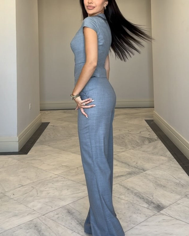 Norielle overal bez rukávů modrý s knoflíky